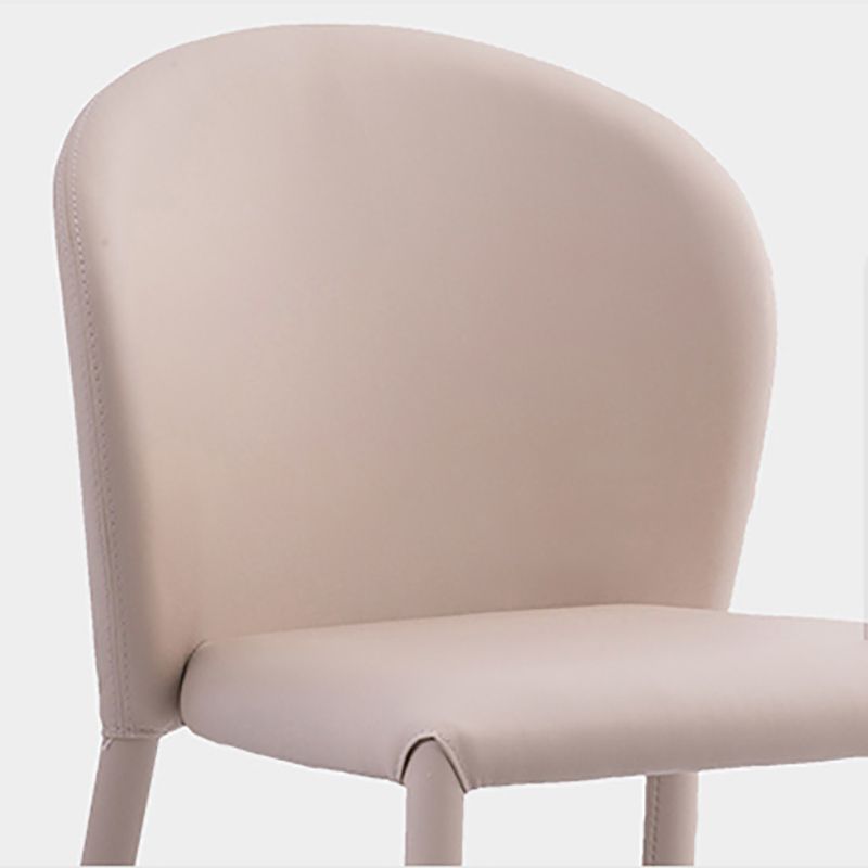 Minimalistische stijl armloze vaste achterzijde stoelen lederen eetkamerstoelen voor thuis