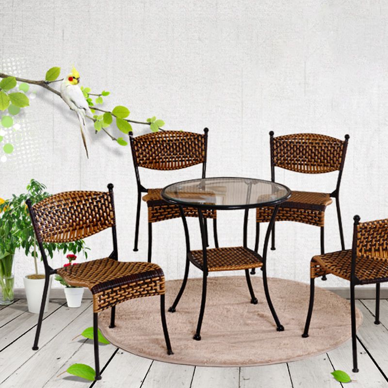 Tropical Dining Side Chair in Brown/Black Plastic with Open Back