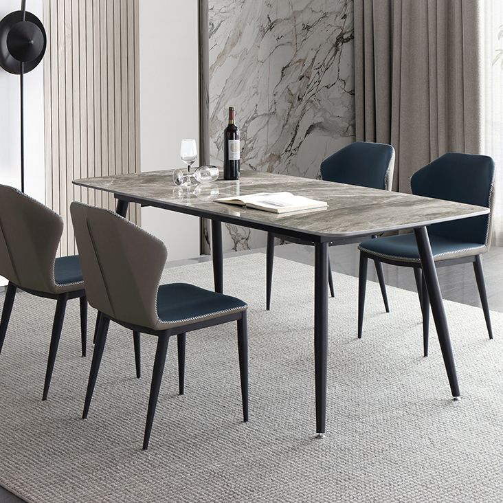 Mesa de comedor estándar industrial de forma rectangular de piedra sinterizada con base de 4 patas