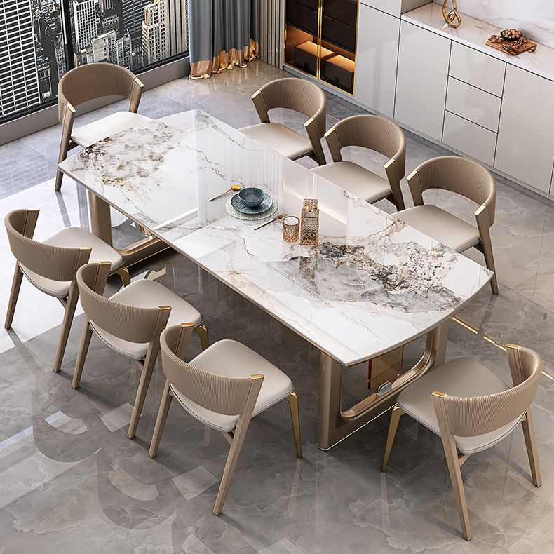 Mesa de comedor de lujo con tapa de piedra sinterizada, mesa rectangular con pedestal doble dorado