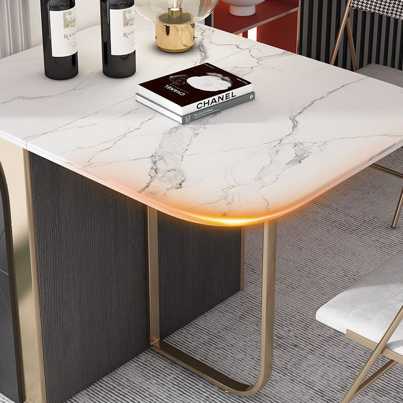 Mesa de comedor rectangular moderna de piedra sinterizada de cabello de 63 "con marco de oro
