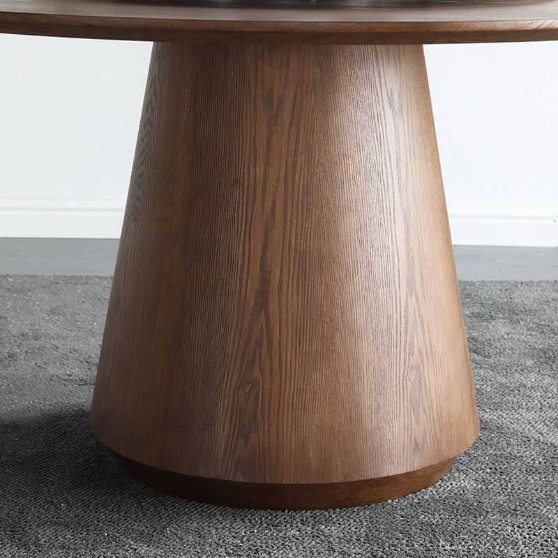 Pedestal Base Is Designed for a Round Coffee Table Made of Walnut Wood