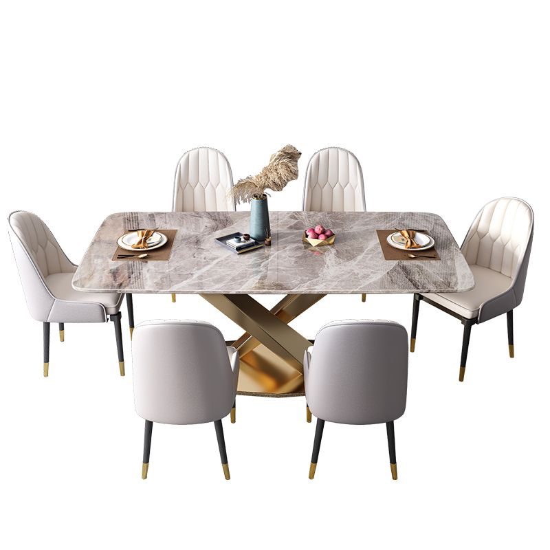 Mesa de comedor de piedra sinterizada de estilo moderno con mesa fija de altura estándar y base de caballete de oro