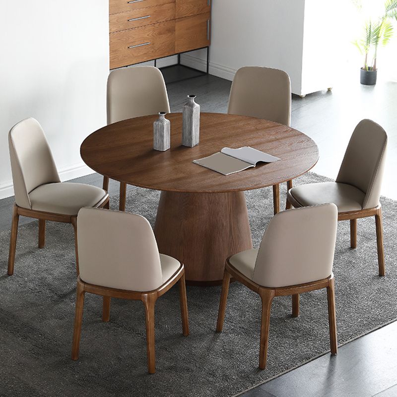 Pedestal Base Is Designed for a Round Coffee Table Made of Walnut Wood