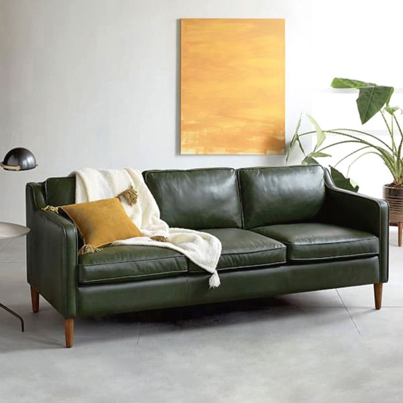 Industrial Faux Leather Loose Back Sofa with Solid Color Sloped Arms