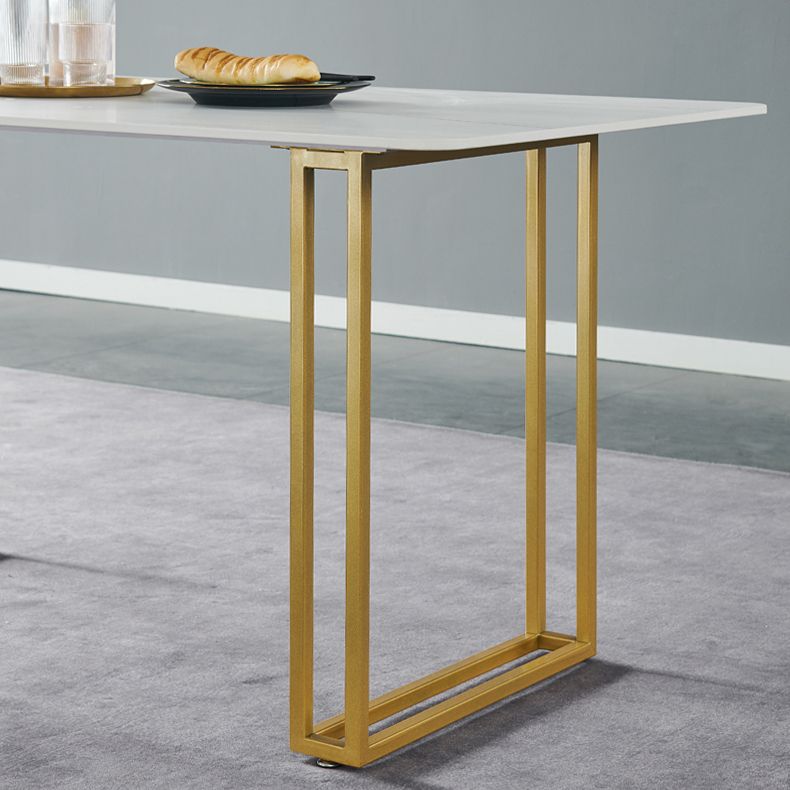 Table à manger en pierre frittée Table à manger de luxe traditionnelle avec cadre doré