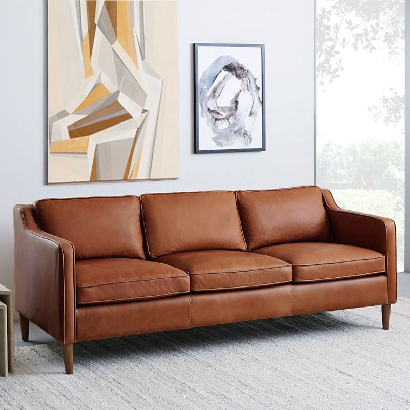 Industrial Faux Leather Loose Back Sofa with Solid Color Sloped Arms