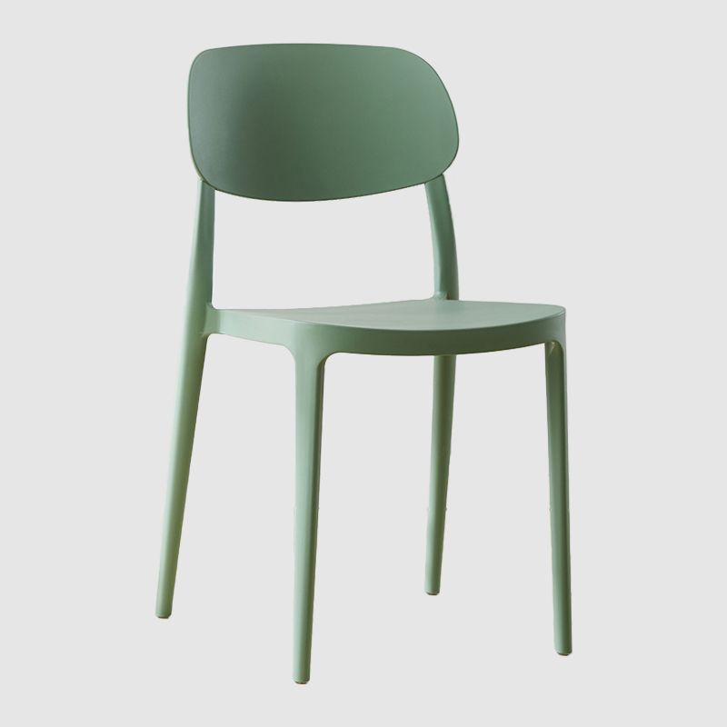 Silla lateral abierta apilable de cena sin brazos del plástico escandinavo de las sillas