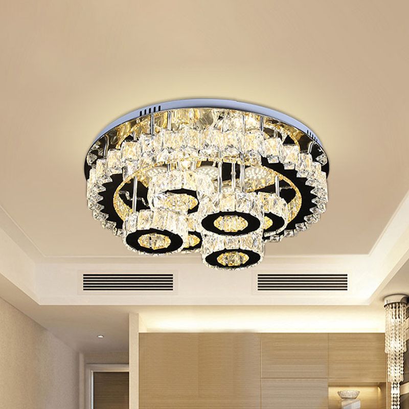 Lumo a soffitto in cristallo simile a un ingranaggio moderno lampada semi-rulli LED in acciaio inossidabile