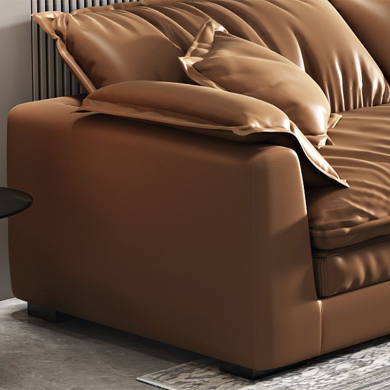 Glam Style Sofa Bed with Sponge Upholstery Filled Orange Faux Leather Sofa