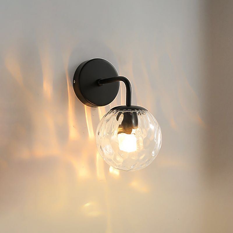Ball Shaped Wall Lamp Minimalist Clear Rippling Glass 1-Light Bedroom Wall Mounted Lighting with Bent Arm in Black/Gold