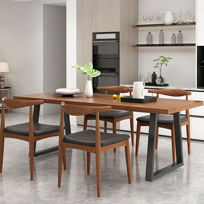 Metal Sled Base Dining Table Modern Solid Wood Top Dining Table in Brown and Black