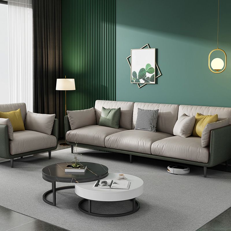 Contemporary Faux Leather Sofa with Pillows Back and Pillow Top Arm