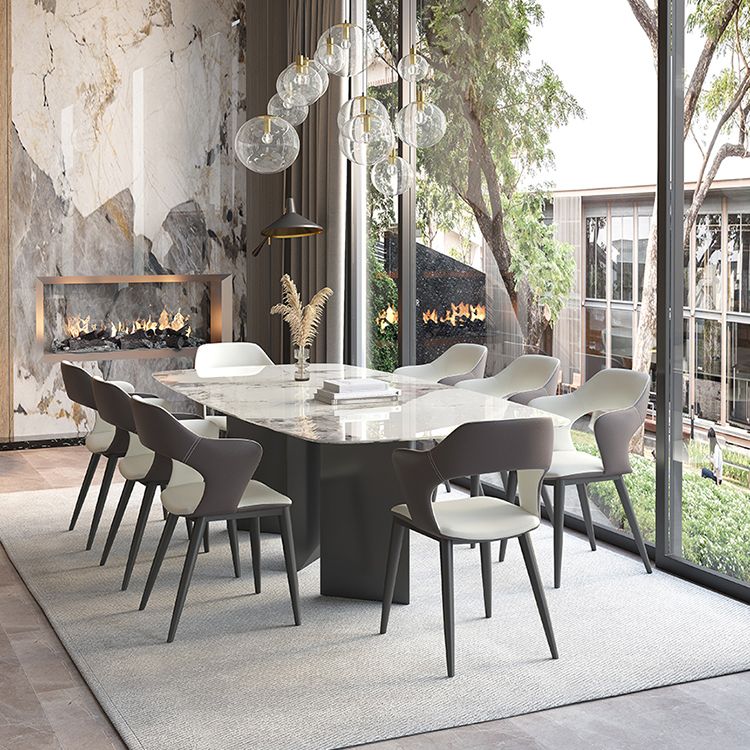 Mesa de comedor contemporánea rectángulo mesa de piedra sinterizada blanca con base de metal negro