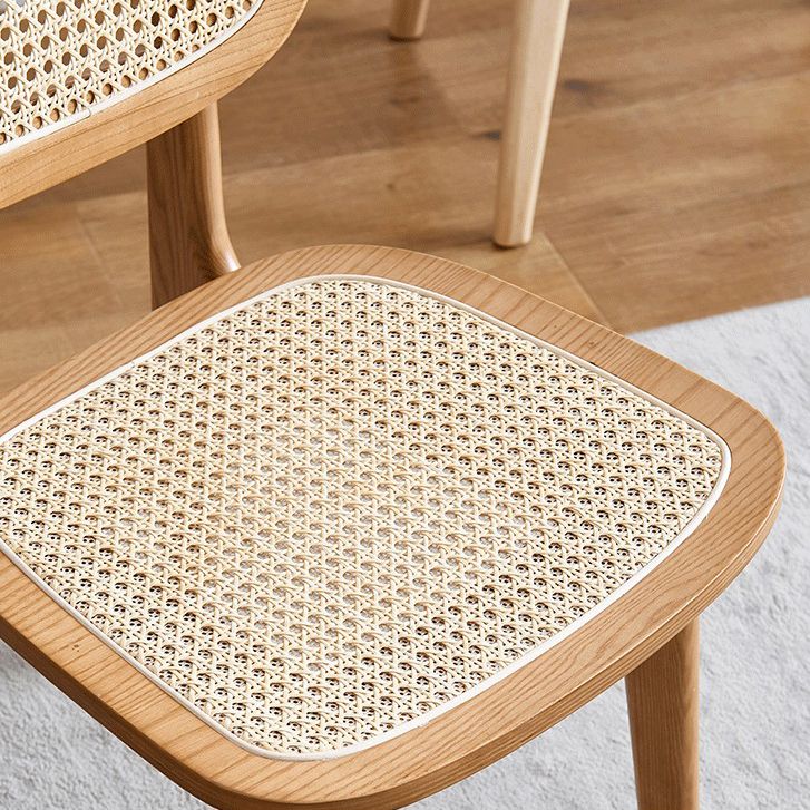 Silla de comedor de madera contemporánea con respaldo abierto, silla lateral para uso doméstico