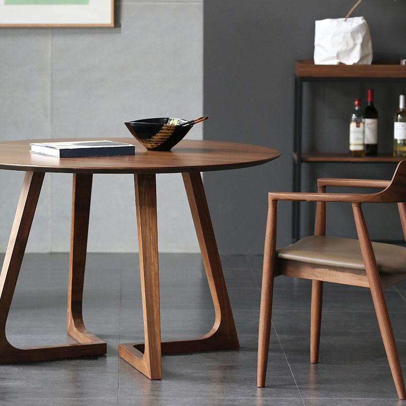 Table à manger moderne ronde table en bois massif marron avec double base de piédestal