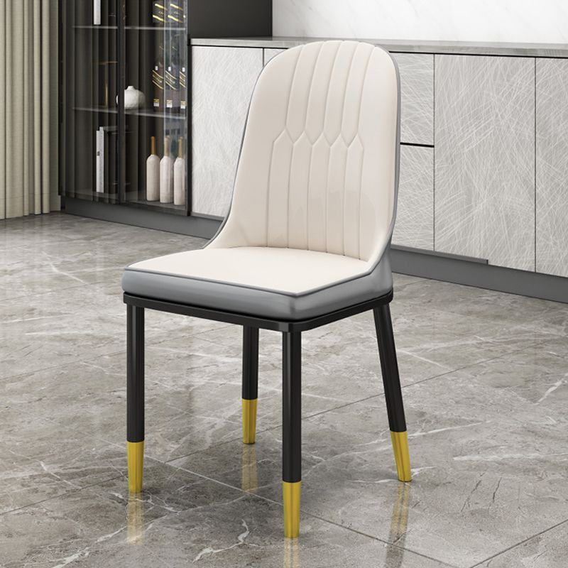 Silla de comedor sin brazos con respaldo sólido de comedor de cuero de PU de estilo escandinavo