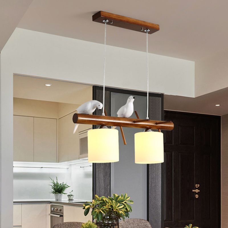 Cylinder Restaurant LED Pendant Light White Glass Simplicity Hanging Island Light with Resin Bird