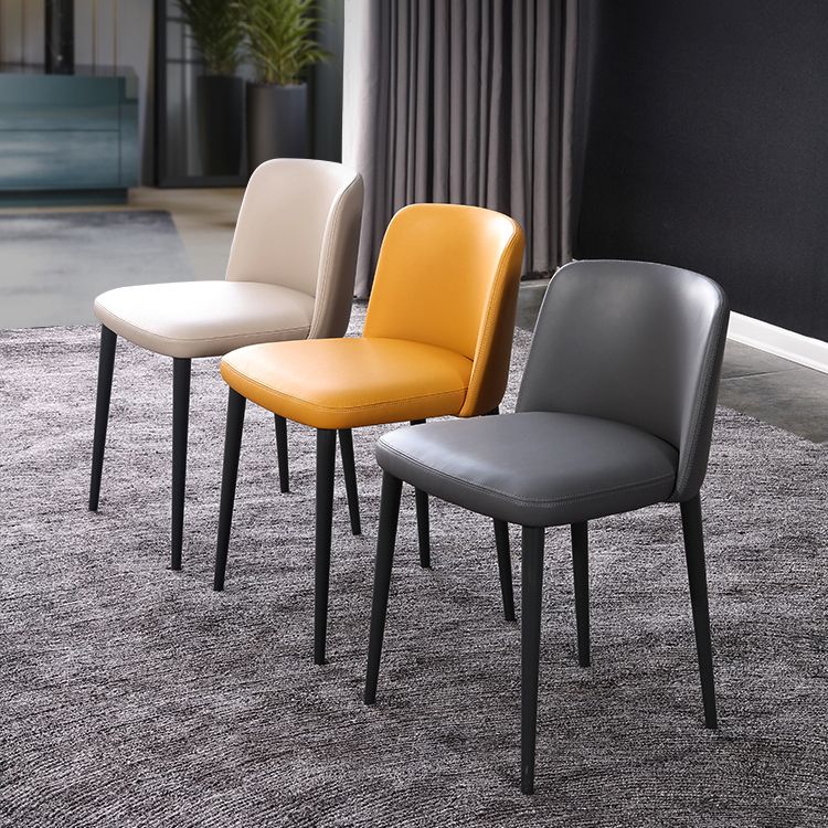 Sillas de comedor de cuero de estilo minimalista Sillas laterales sin brazos con respaldo sólido (juego de 2)