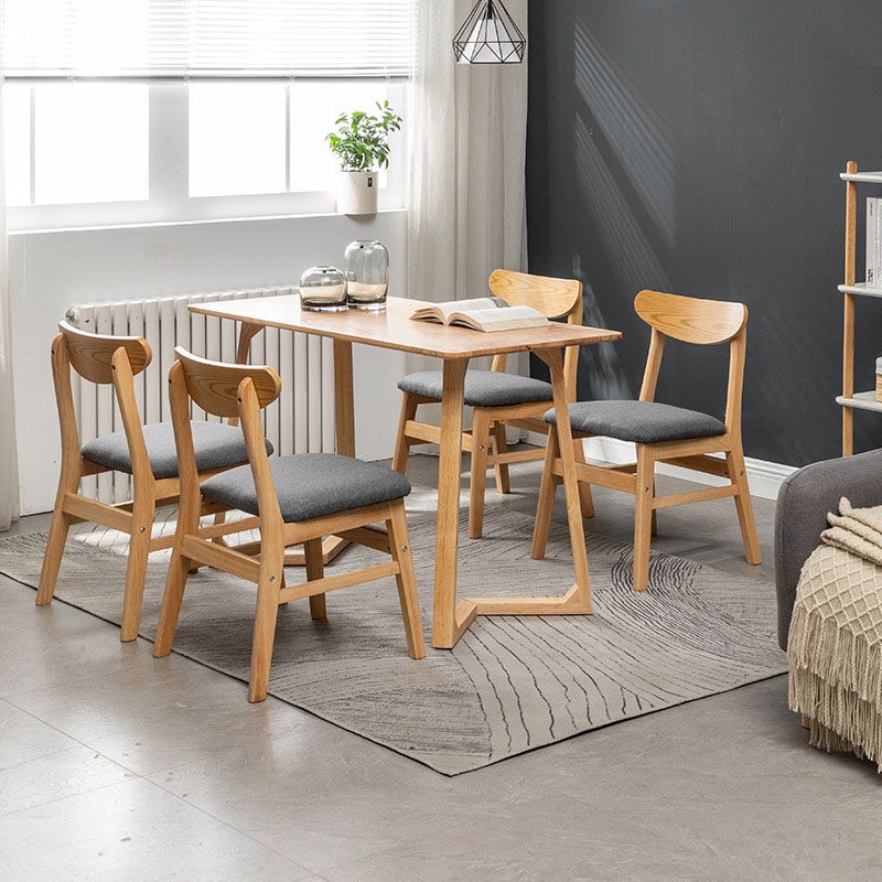 Silla lateral casera tapizada escandinava Silla de comedor natural con respaldo abierto