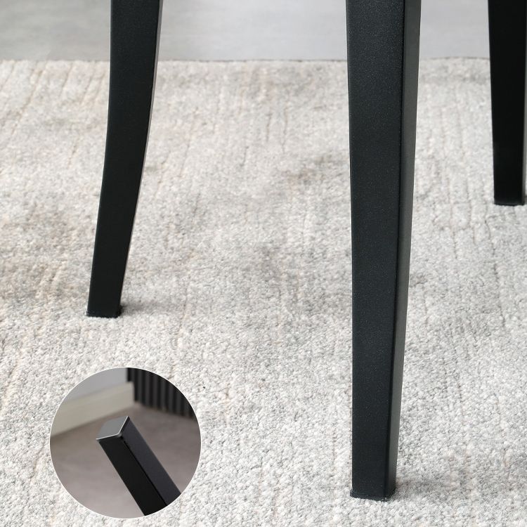 Silla de comedor contemporánea con acabado mate, respaldo abierto de cuero, silla lateral