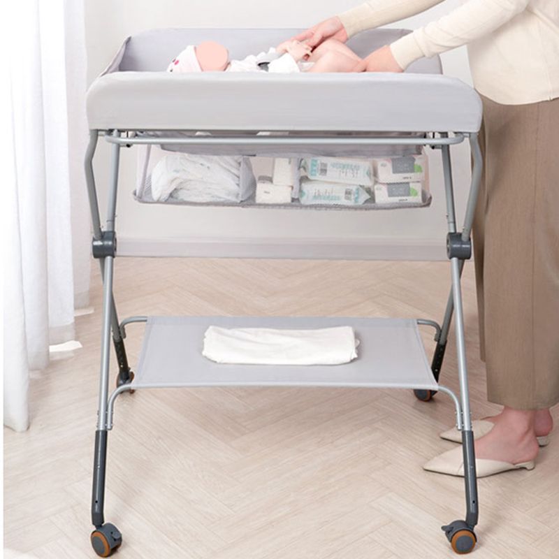 Flat Top Baby Changing Table Modern Style in Metal Frame with Storage Basket