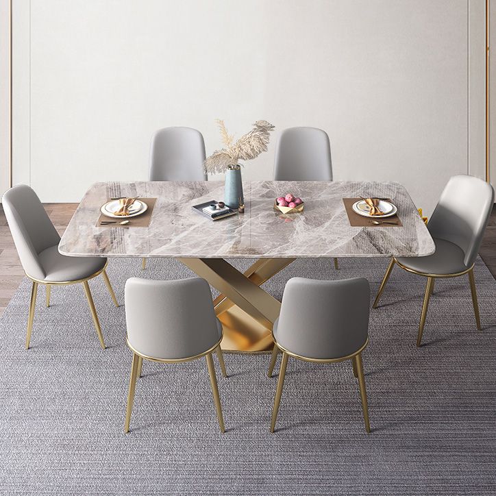 Mesa de comedor de lujo tradicional rectángulo mesa de piedra sinterizada gris con base de pedestal dorado