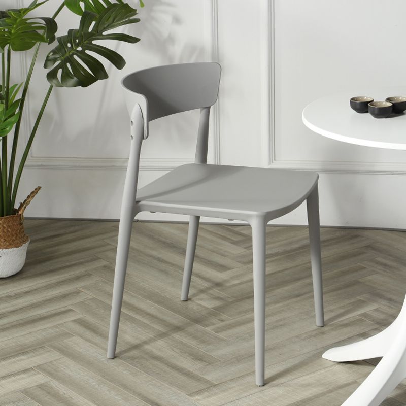 Silla sin brazos de comedor de plástico escandinavo, silla lateral con respaldo abierto