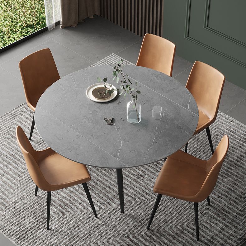Mesa de comedor redonda Simplicity de piedra sinterizada con 4 patas negras para comedor