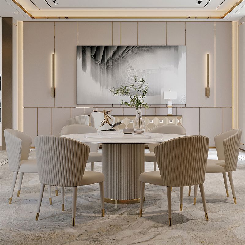Mesa de comedor de piedra sinterizada mesa redonda de lujo con pedestal de metal en blanco