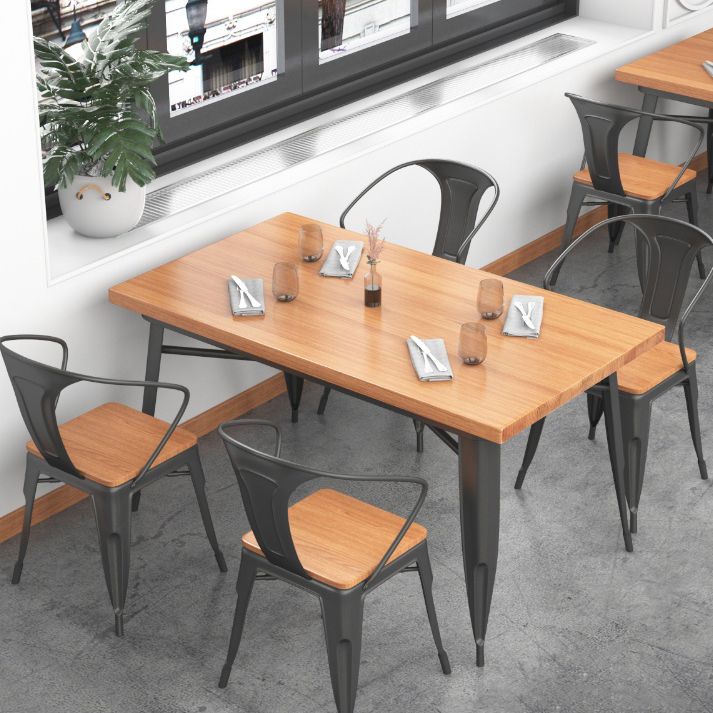 Mesa de comedor de madera sólida Mesa de comedor industrial de 4 patas con base de metal