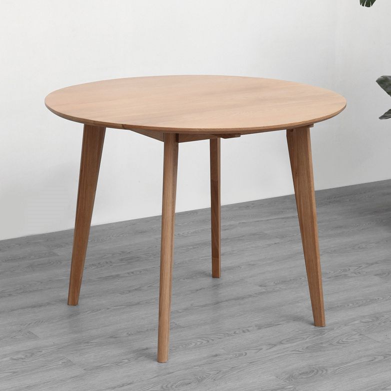 Mesa de comedor redonda contemporánea mesa de madera maciza con 4 patas para el comedor