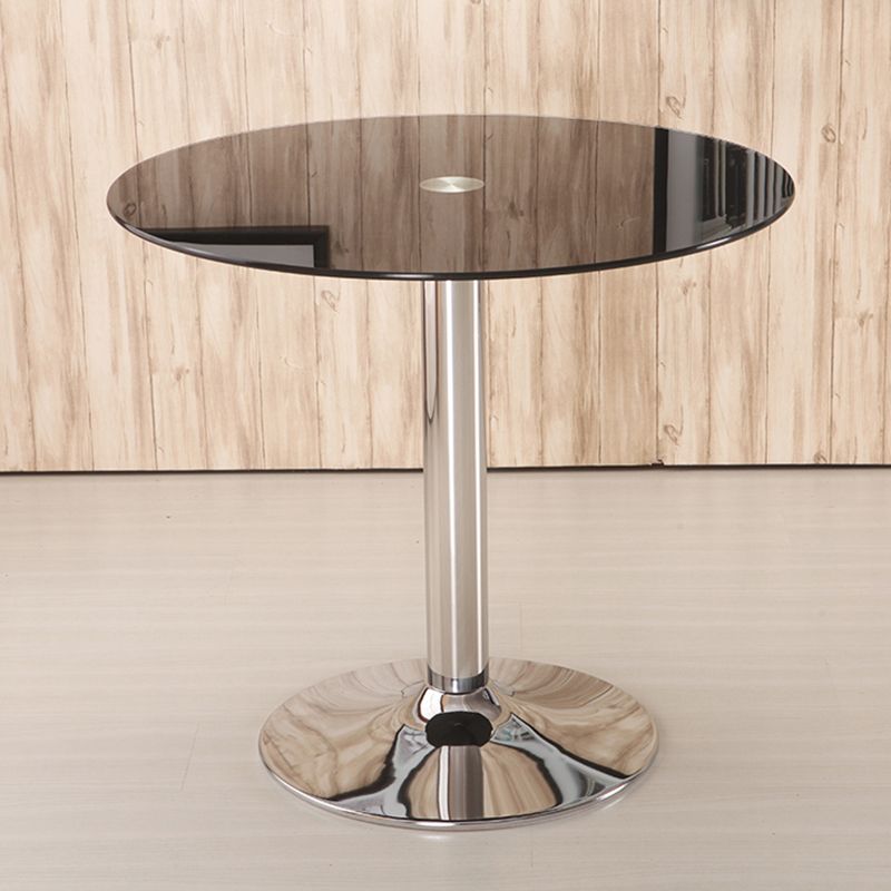 Moderne ronde eettafel van gehard glas met tulponderstel voor eetkamer