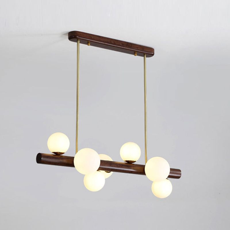 Luces colgantes de restaurantes de múltiples cabezas de madera moderna con sombra de vidrio de globo