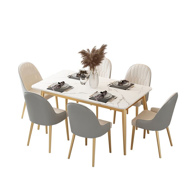 Mesa de comedor de piedra sinterizada de estilo moderno con 4 patas de oro base para uso en el hogar