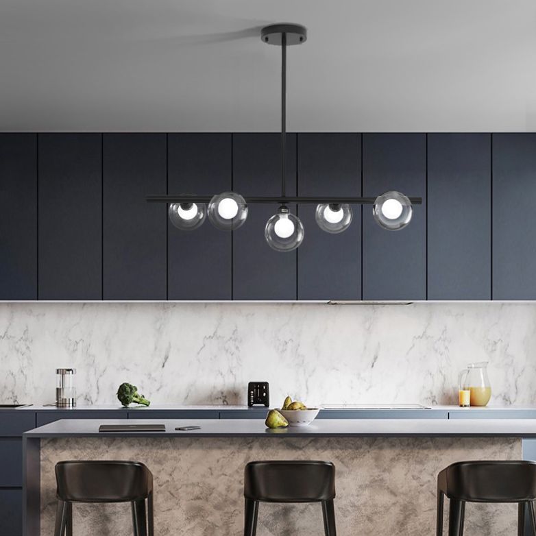 Luz de la isla de vidrio global transparente en el estilo creativo moderno Luz de colgante de hierro forjado para el comedor