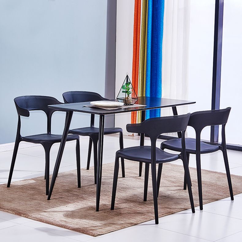 Sillas de comedor plásticas escandinavas sin brazos apilables que cenan la silla lateral