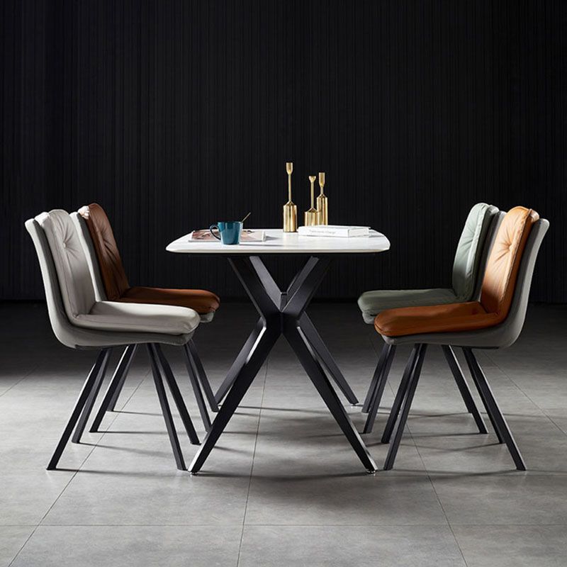 Sillas laterales con respaldo sólido sin brazos de diseño minimalista Sillas de comedor de cuero