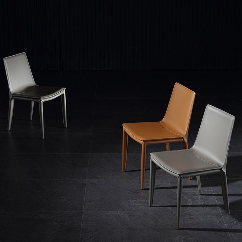 Silla de comedor sin brazos de cuero contemporánea Sillas de comedor de metal