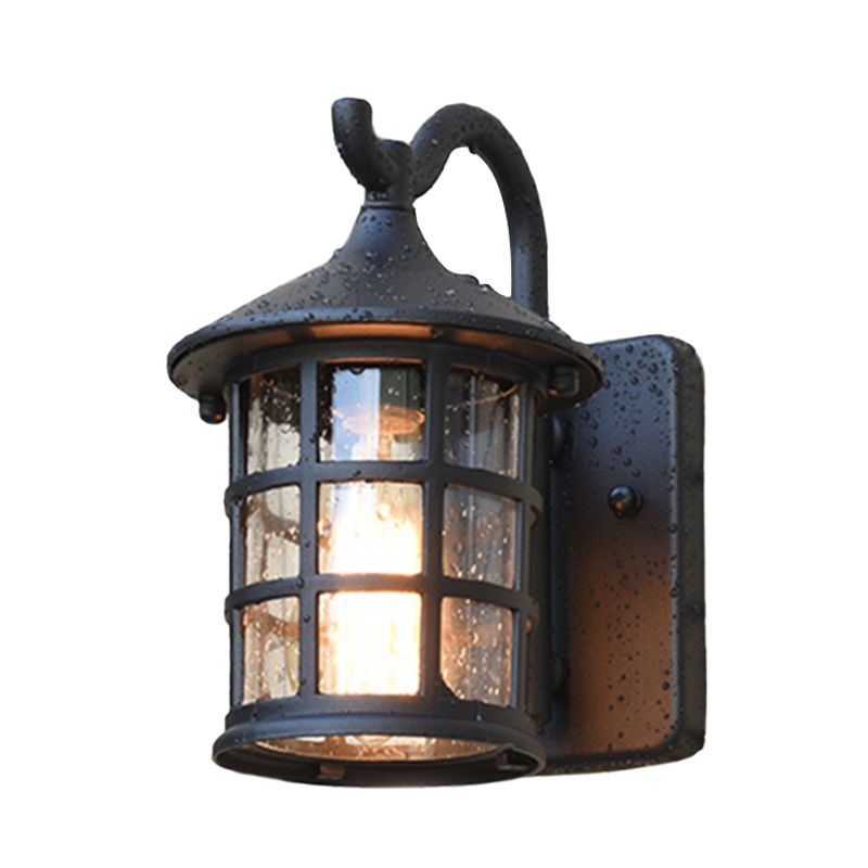 Geplaatste glazen lantaarn wandlamp platteland een lichte buitenmuurlicht in brons/zwart