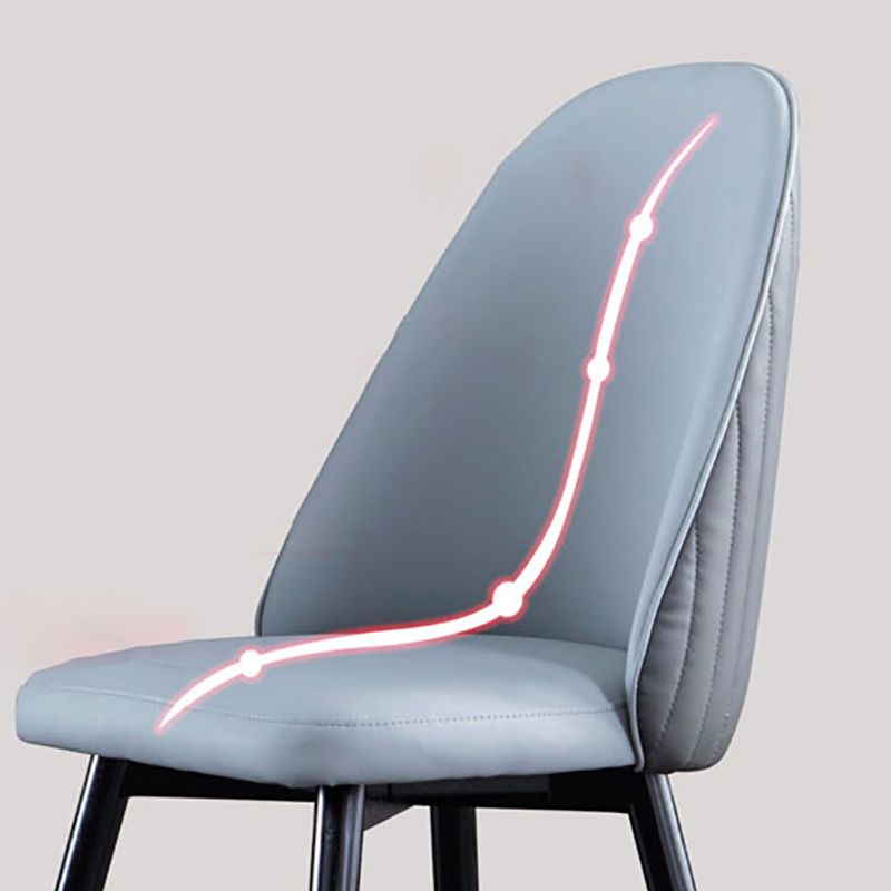 Chaise de salle à manger de style scandinave en cuir et bois, sans accoudoirs, à dossier solide