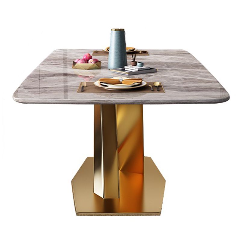 Mesa rectangular de lujo tradicional, mesa de piedra sinterizada gris con base de pedestal dorado