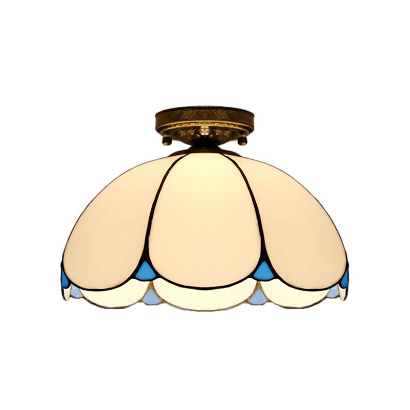 Vetro colorato a filo smerlato