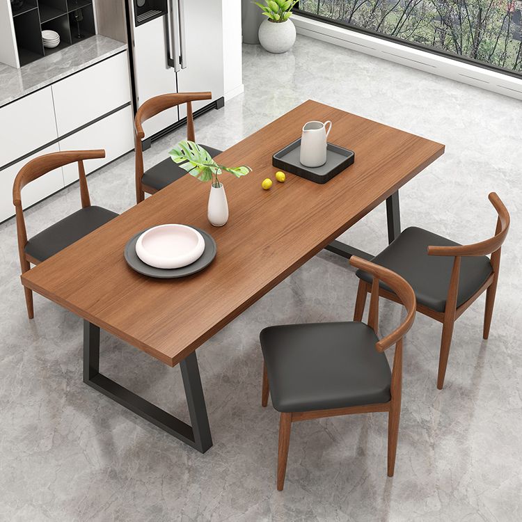 Metal Sled Base Dining Table Modern Solid Wood Top Dining Table in Brown and Black