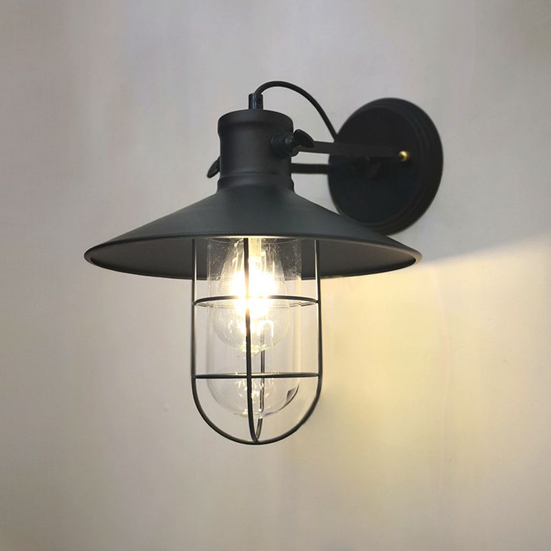 Lámpara de apliques de hierro negro industrial de pared de 1 luces con cápsula con jaula de cápsula y sombra de vidrio transparente