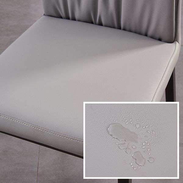 Moderne zeitgenössische Leder -Parsons -Stuhlseite Essstühle mit Metallbeinen
