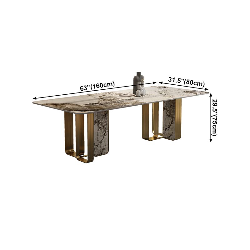 Mesa de comedor de piedra sinterizada de lujo con metal y piedra doble pedestal en oro