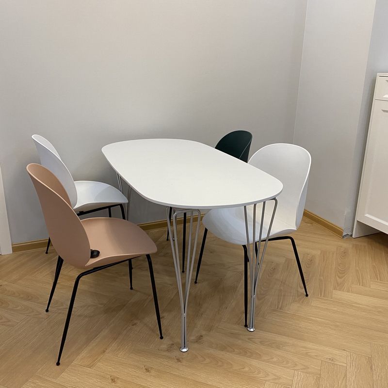 Modern White Sintered Stone Dining Table Oval Shape Standard Dining Table with 4 Legs Base