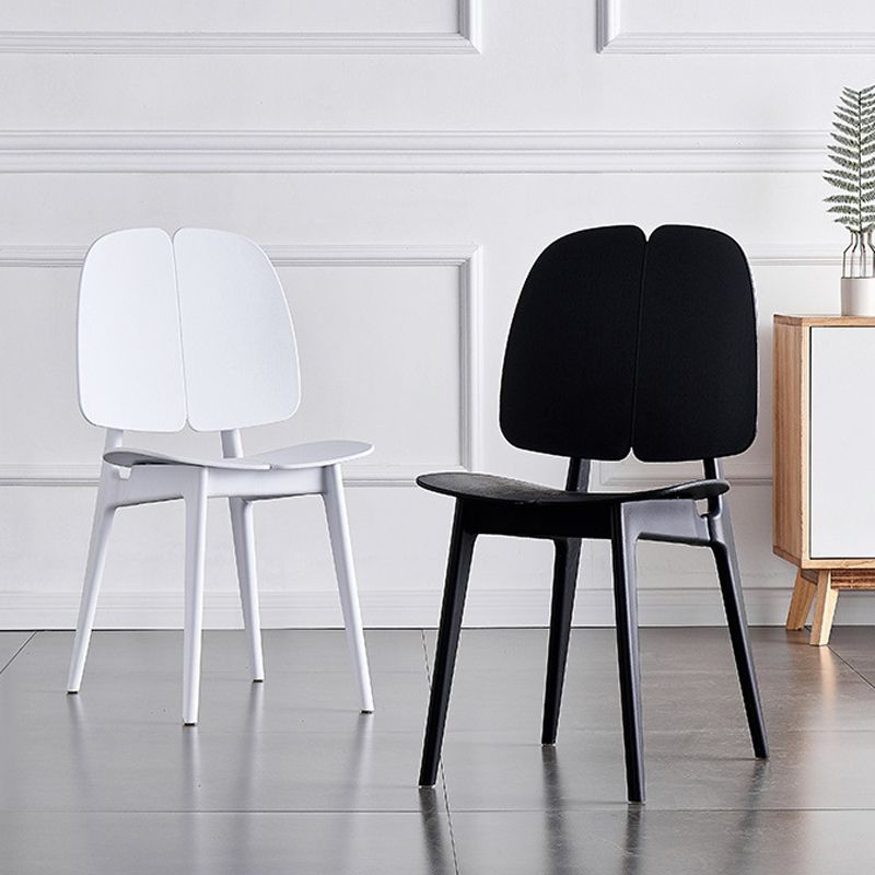 Sillas de comedor y decorativas contemporáneas Silla lateral de plástico con respaldo abierto para interiores y exteriores