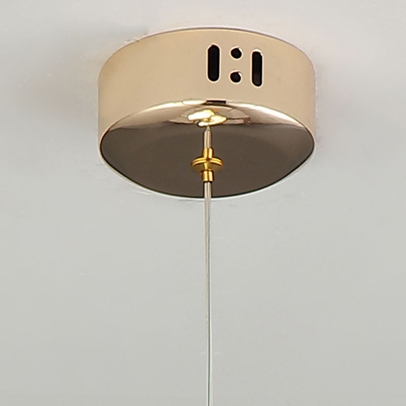 Éclairage pendentif en or